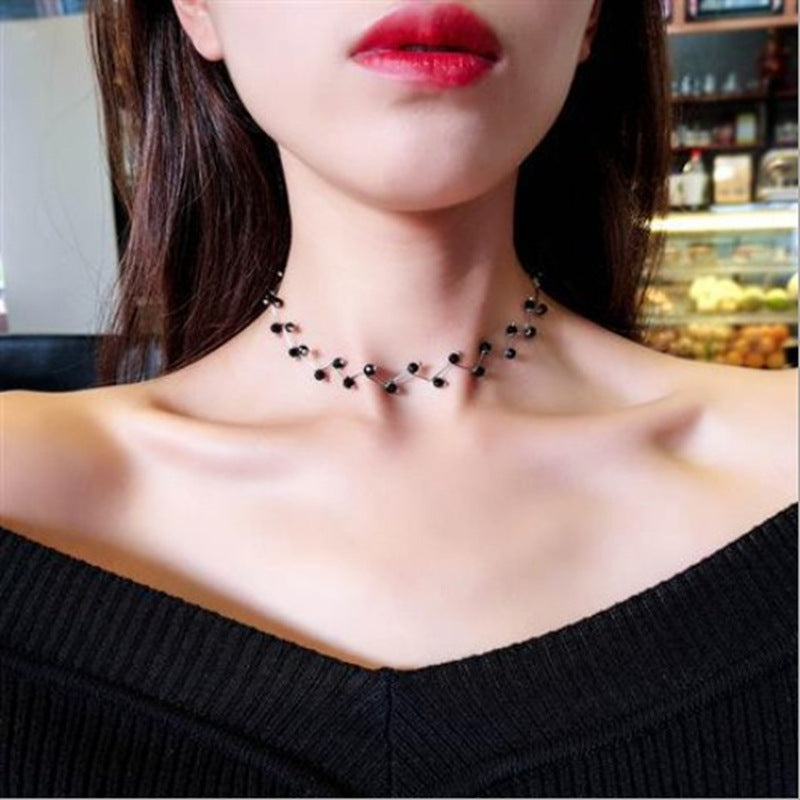 Talise dark stone-style vine necklace
