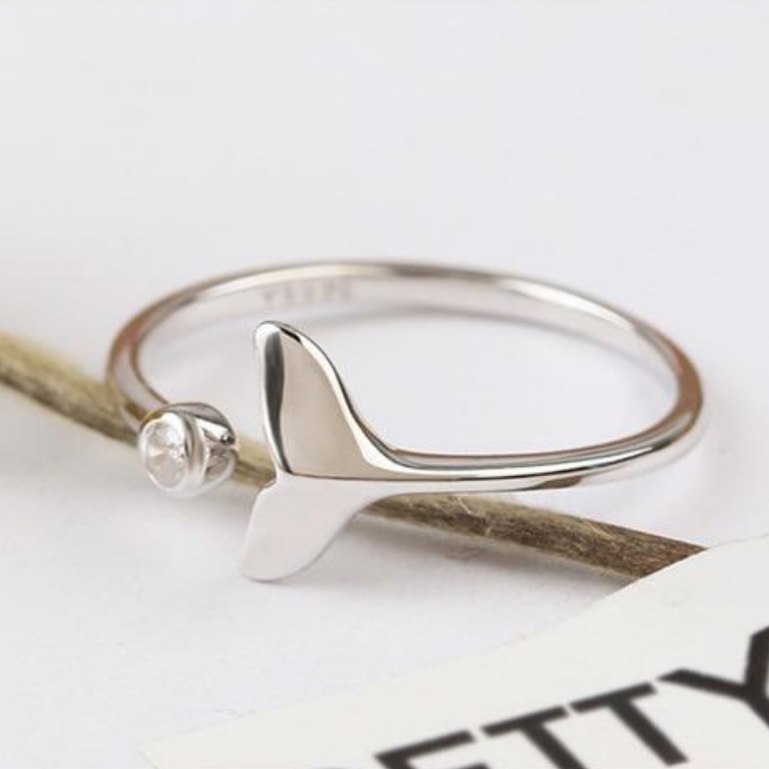 Adjustable Silver-Tone ring with zirconias and dolphin tail