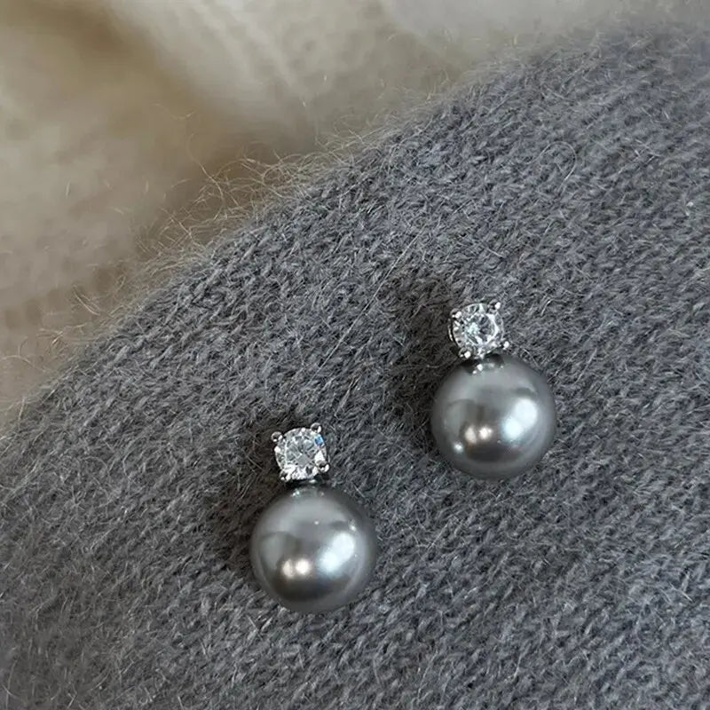 Elegant black bead-style earrings with zirconia